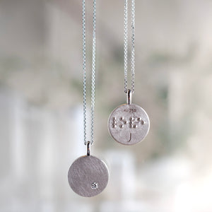 20th Anniversary Re-release: Love Coin in 18k Grey